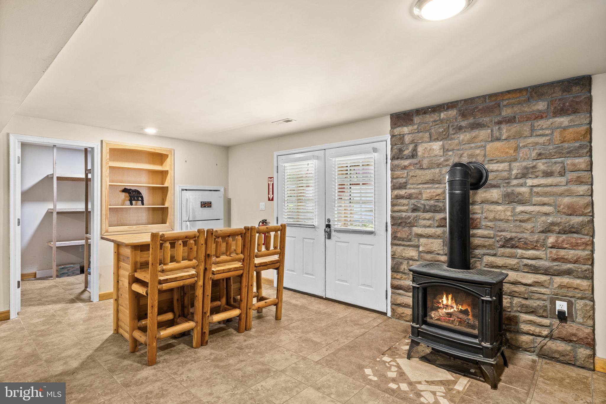 12615 Post Oak Road Spotsylvania, VA 22551 - Photo 34 of 67 Lower Level Bar Area and Gas Fireplace