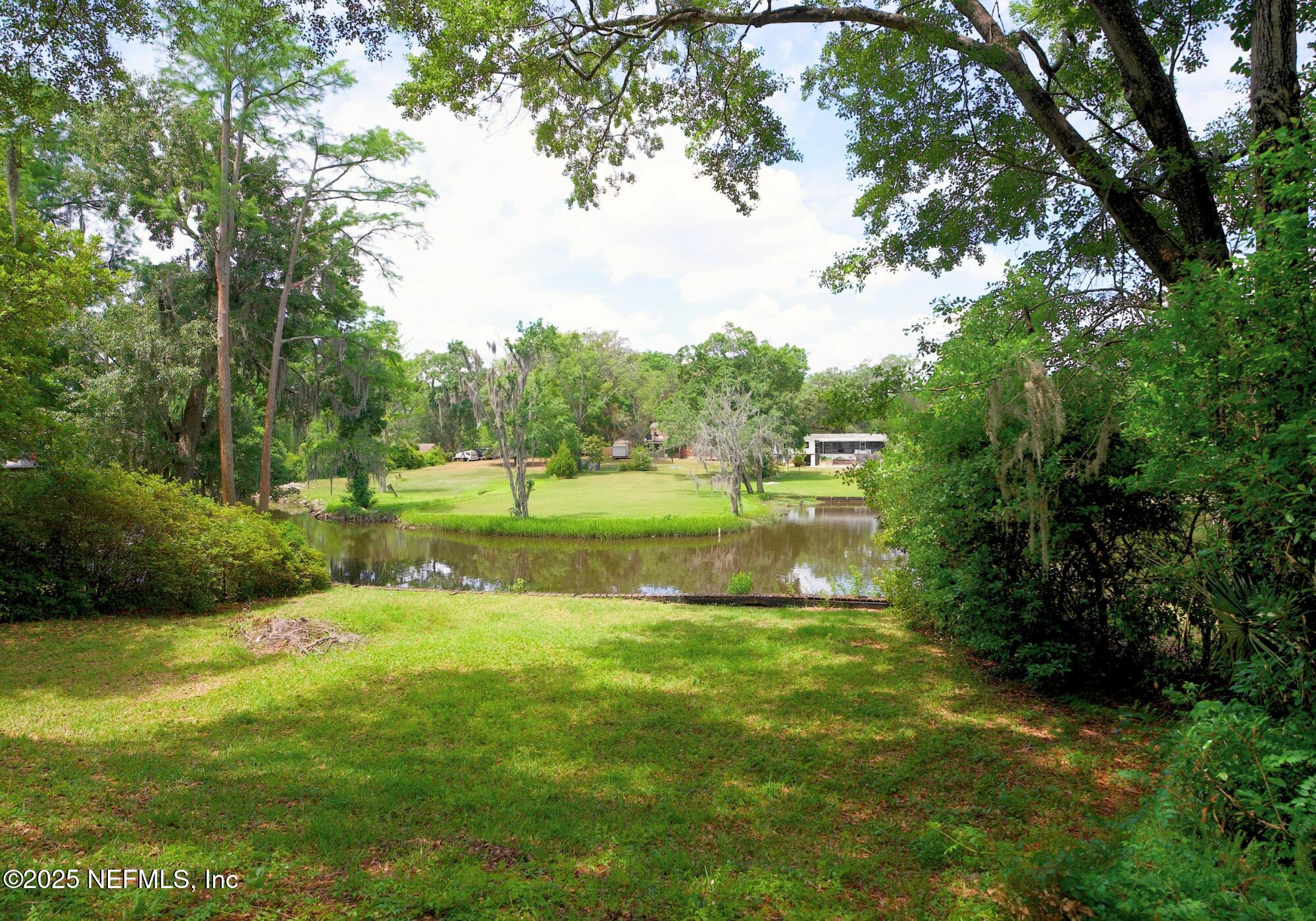 5152 Eulace Road Jacksonville, FL 32210 - Photo 22 of 24 Back Yard/Pond