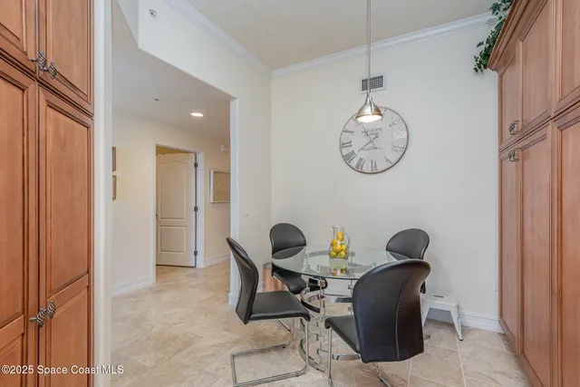 a view of a room with chair and tables