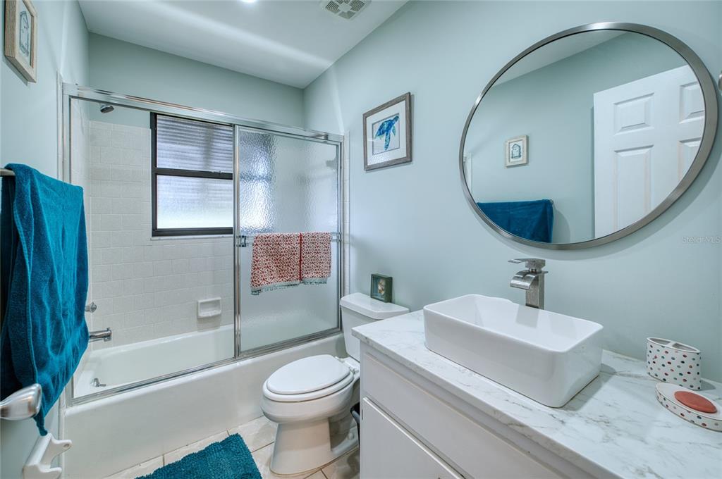 76 Sandstone Circle Venice, FL 34293 - Photo 14 of 37 a bathroom with a toilet sink and bathtub