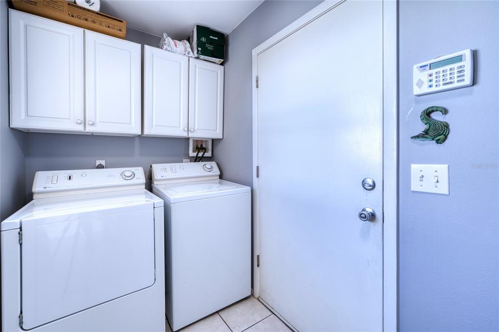 76 Sandstone Circle Venice, FL 34293 - Photo 15 of 37 a utility room with dryer and washer