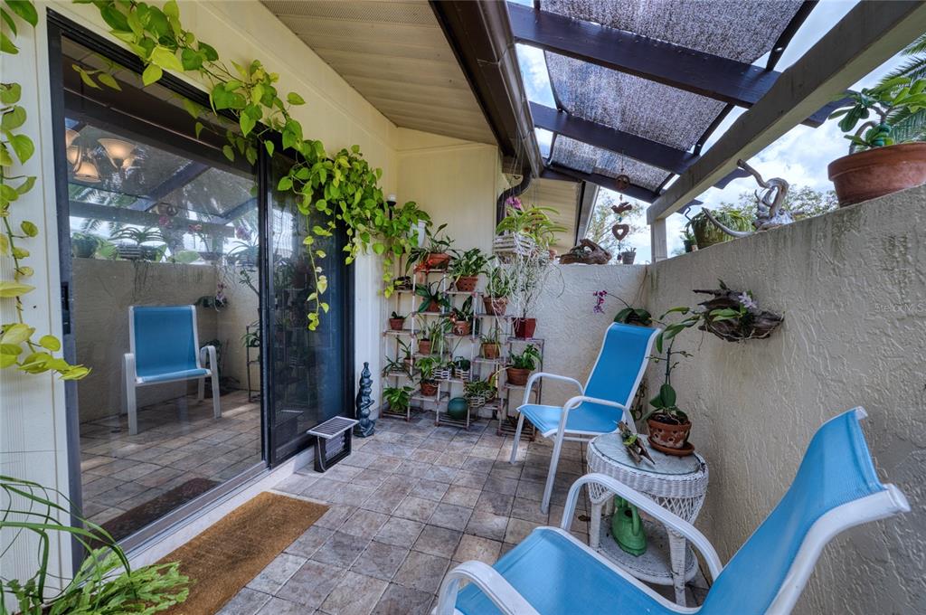 76 Sandstone Circle Venice, FL 34293 - Photo 16 of 37 a view of porch with seating space