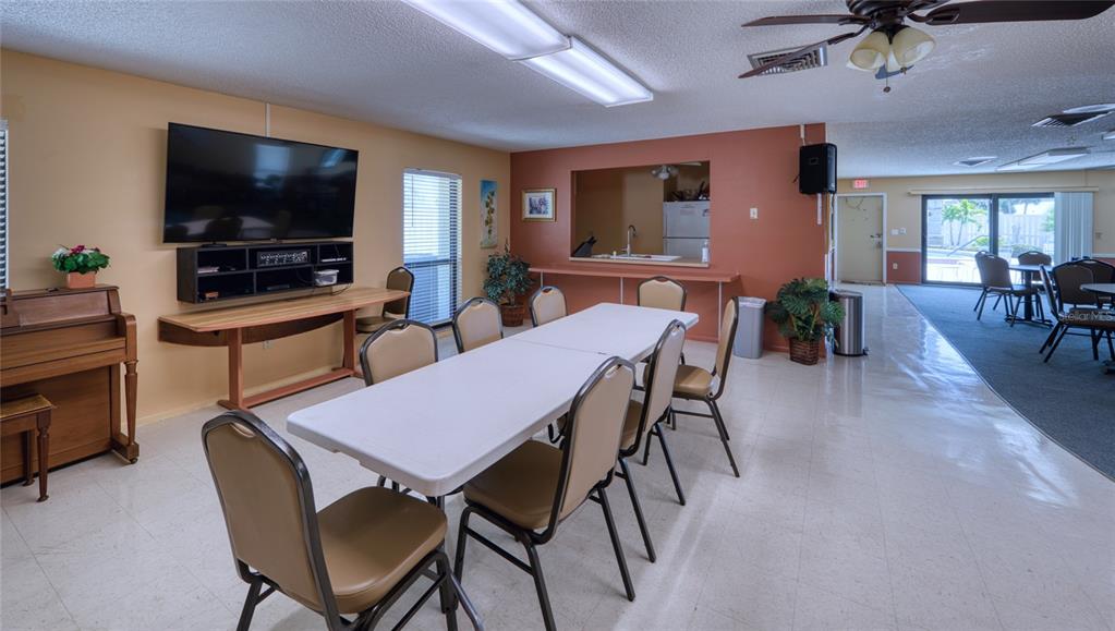 76 Sandstone Circle Venice, FL 34293 - Photo 28 of 37 a dining room with furniture and window