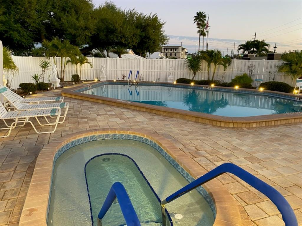 76 Sandstone Circle Venice, FL 34293 - Photo 29 of 37 a swimming pool with outdoor seating and yard