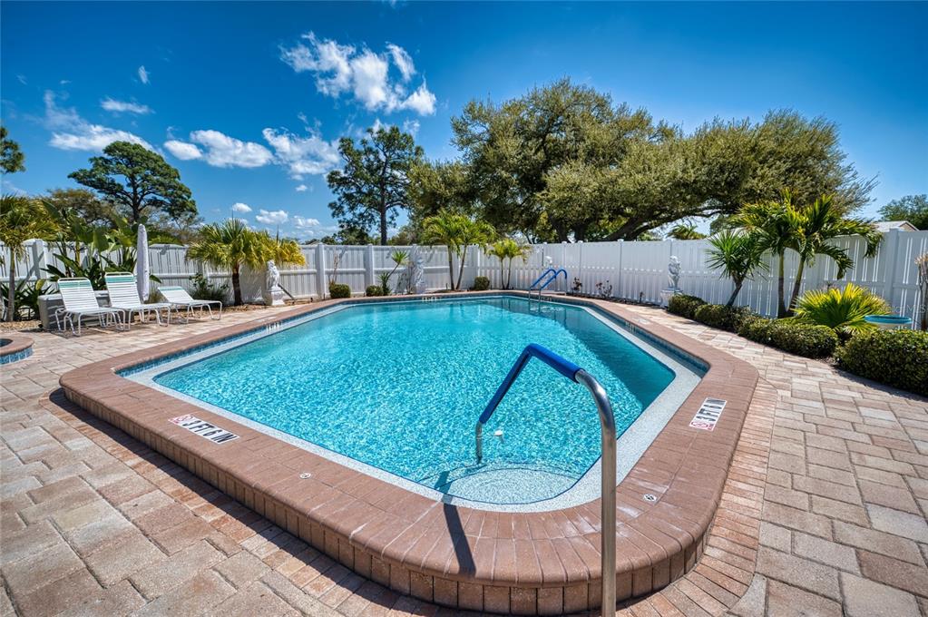 76 Sandstone Circle Venice, FL 34293 - Photo 32 of 37 a view of a swimming pool with a patio