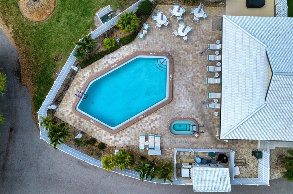 76 Sandstone Circle Venice, FL 34293 - Photo 34 of 37 an aerial view of a house with a yard and outdoor seating