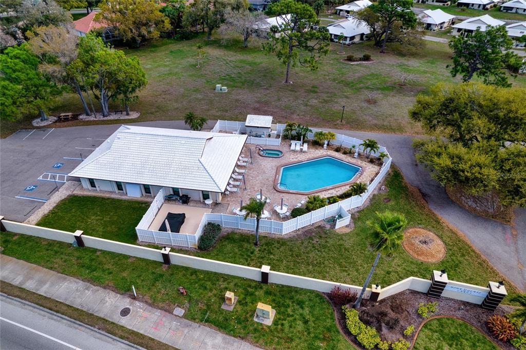 76 Sandstone Circle Venice, FL 34293 - Photo 36 of 37 an aerial view of a house with garden space and street view