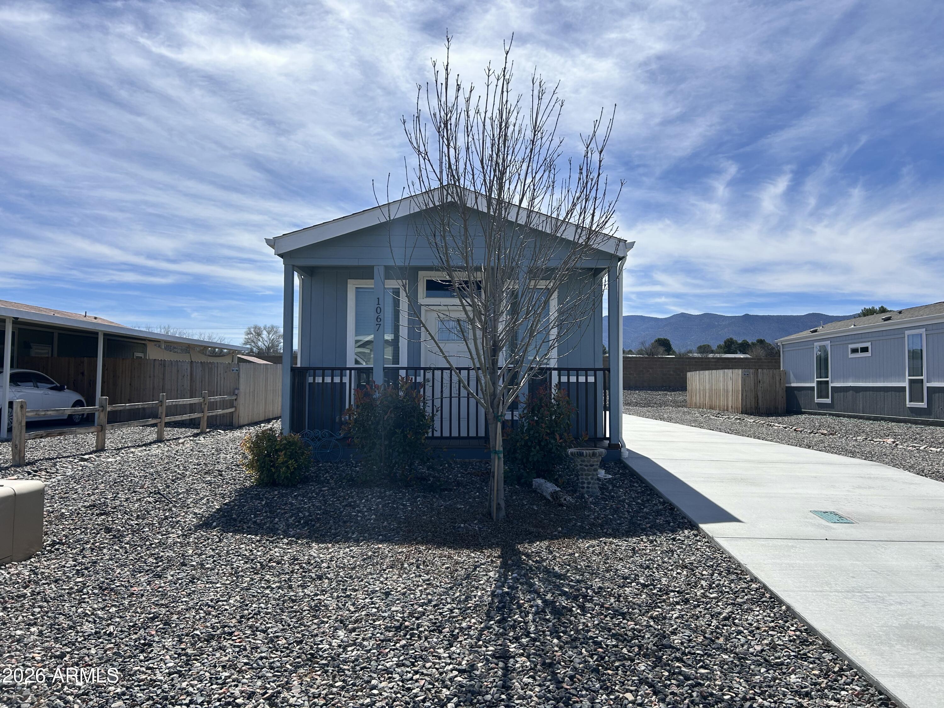 1067 Thorton Road Camp Verde, AZ 86322 - Photo 1 of 21 a view of a house with a yard
