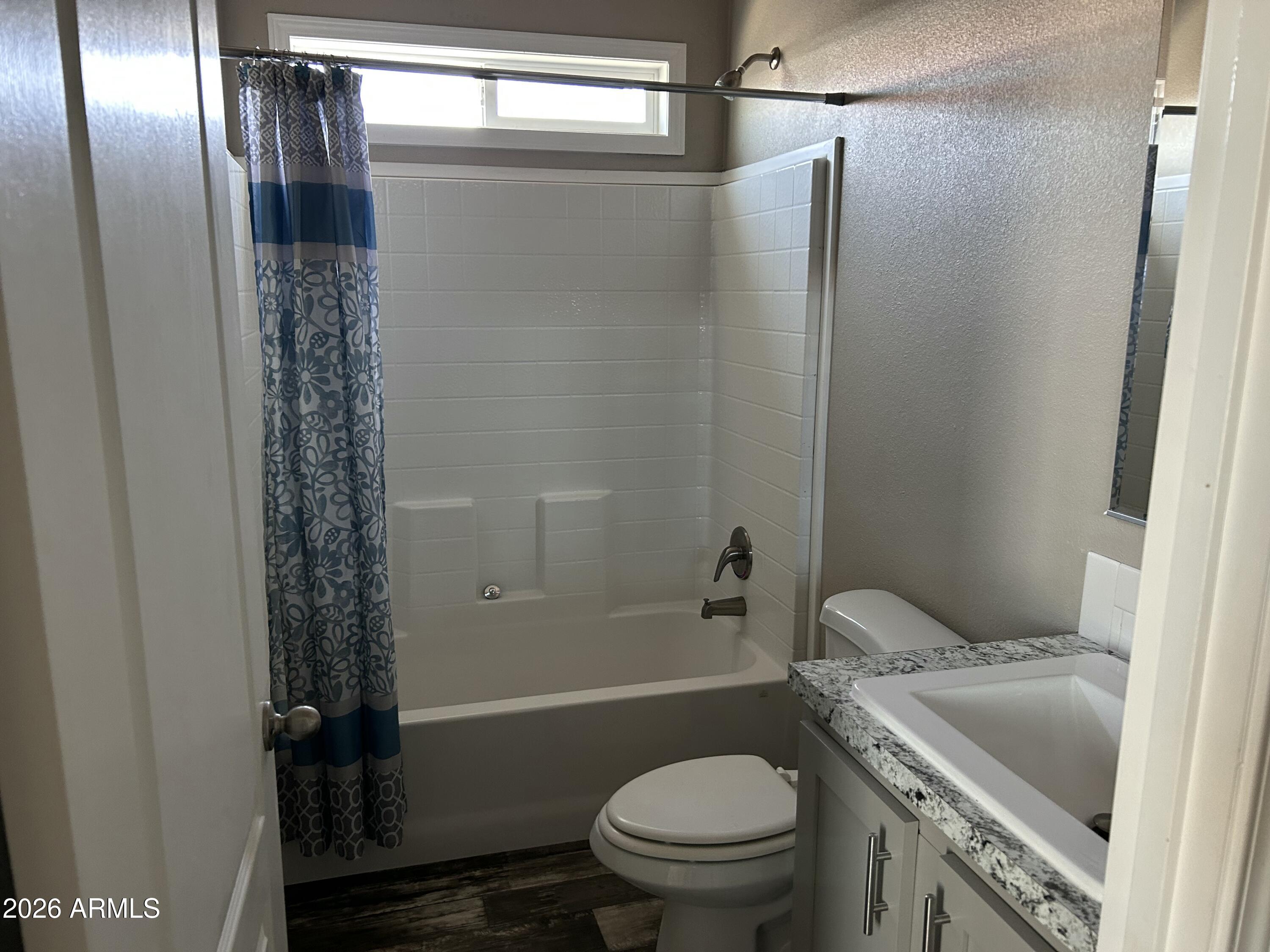 1067 Thorton Road Camp Verde, AZ 86322 - Photo 11 of 21 a bathroom with a shower a toilet and a sink