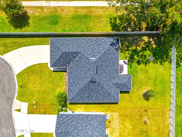a view of swimming pool from a balcony