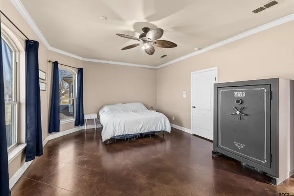 a room with furniture and wooden floor
