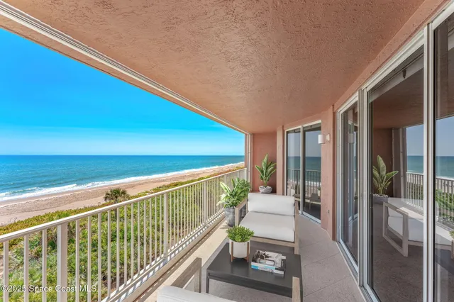 a view of building with an outdoor space and seating space