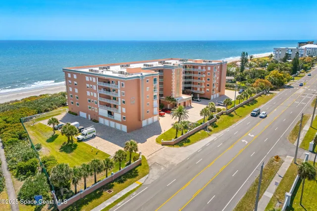 a view of swimming pool with seating area