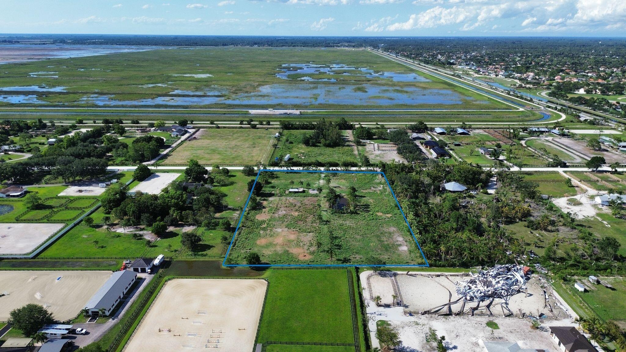 16290 Rustic Road Wellington, FL 33470 - Photo 16 of 20 a view of a city