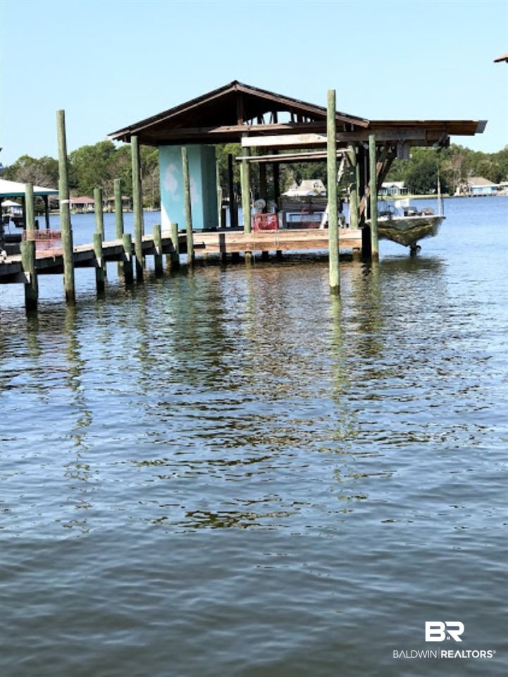 8411 Bay Harbor Road Elberta, AL 36530 - Photo 10 of 17 500 sq.ft. covered deck area w boat lift
