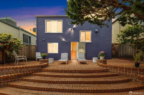 a front view of a house with entertaining space