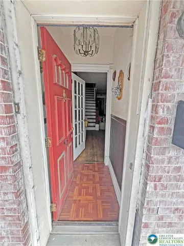 a entryway with a rug