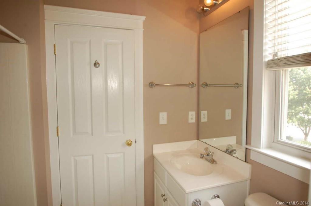 8202 Townley Road Huntersville, NC 28078 - Photo 14 of 24 a bathroom with a sink and a mirror