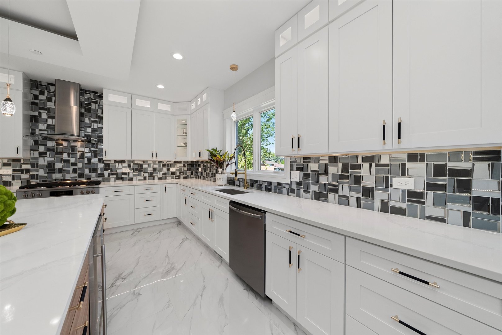 10441 South 83rd Avenue Palos Hills, IL 60465 - Photo 14 of 47 a kitchen with granite countertop white cabinets and white stainless steel appliances