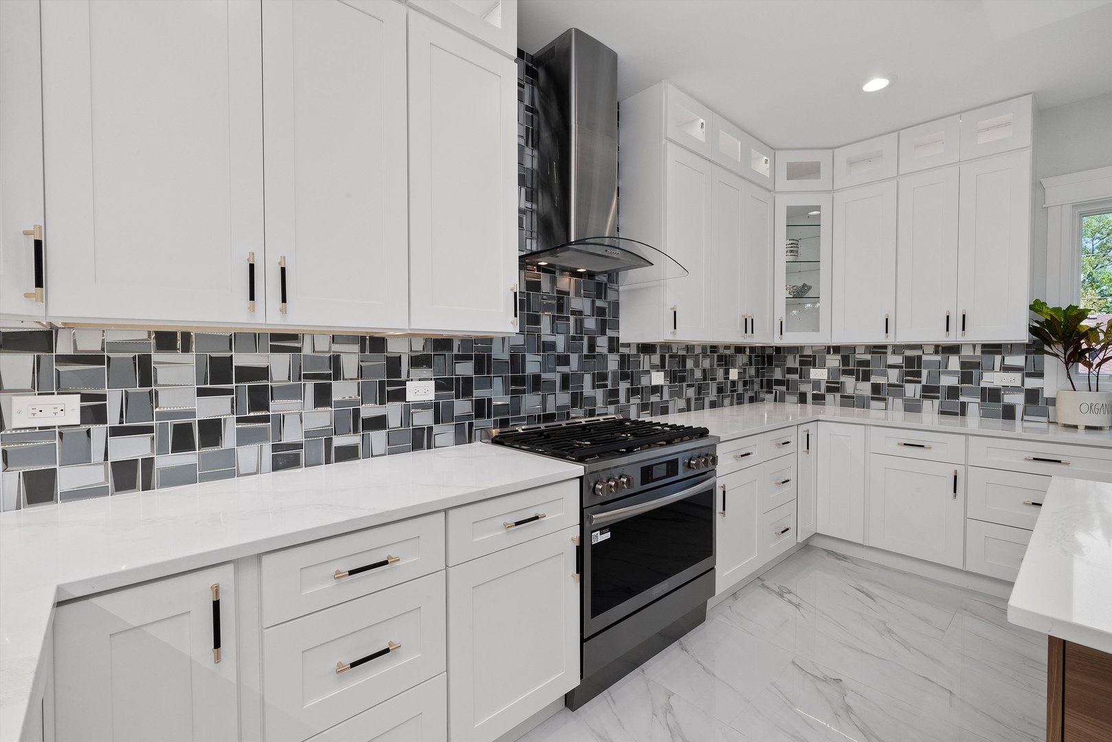 10441 South 83rd Avenue Palos Hills, IL 60465 - Photo 17 of 47 a kitchen with white cabinets and appliances