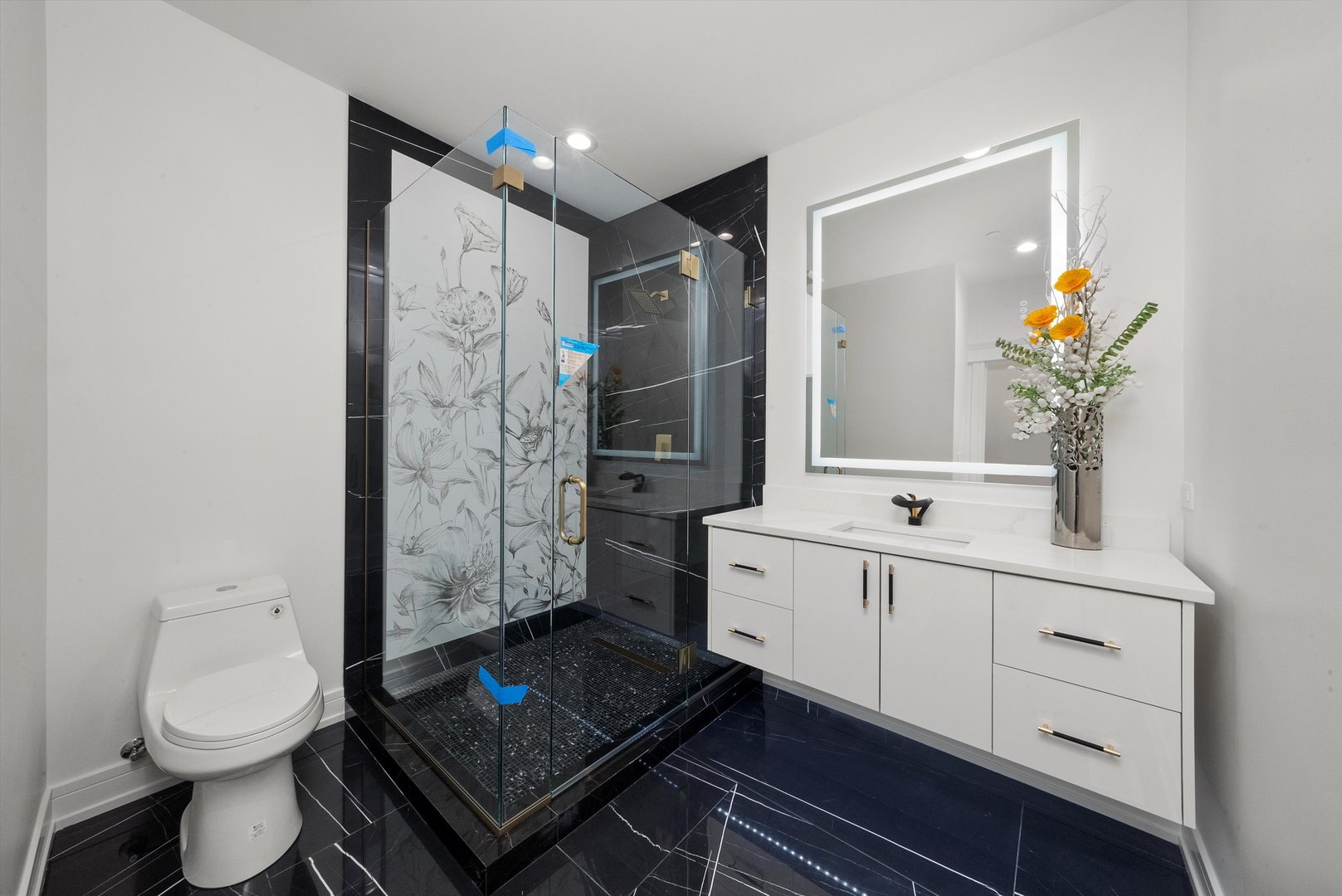 10441 South 83rd Avenue Palos Hills, IL 60465 - Photo 20 of 47 a bathroom with a double vanity sink toilet and shower