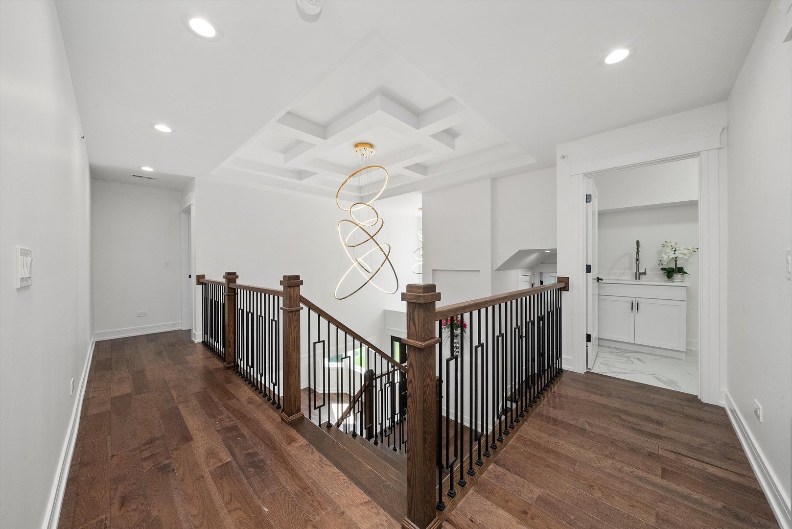 10441 South 83rd Avenue Palos Hills, IL 60465 - Photo 21 of 47 a view of a hallway with a chandelier