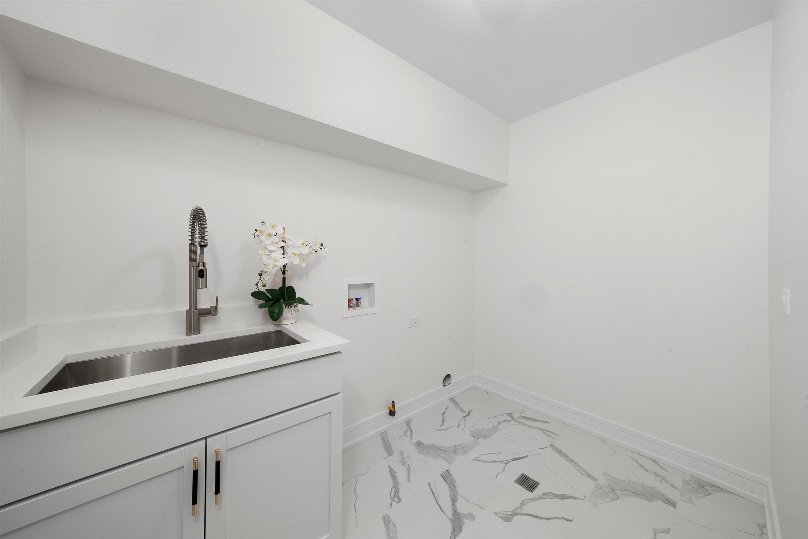 10441 South 83rd Avenue Palos Hills, IL 60465 - Photo 32 of 47 a bathroom with a sink and vanity