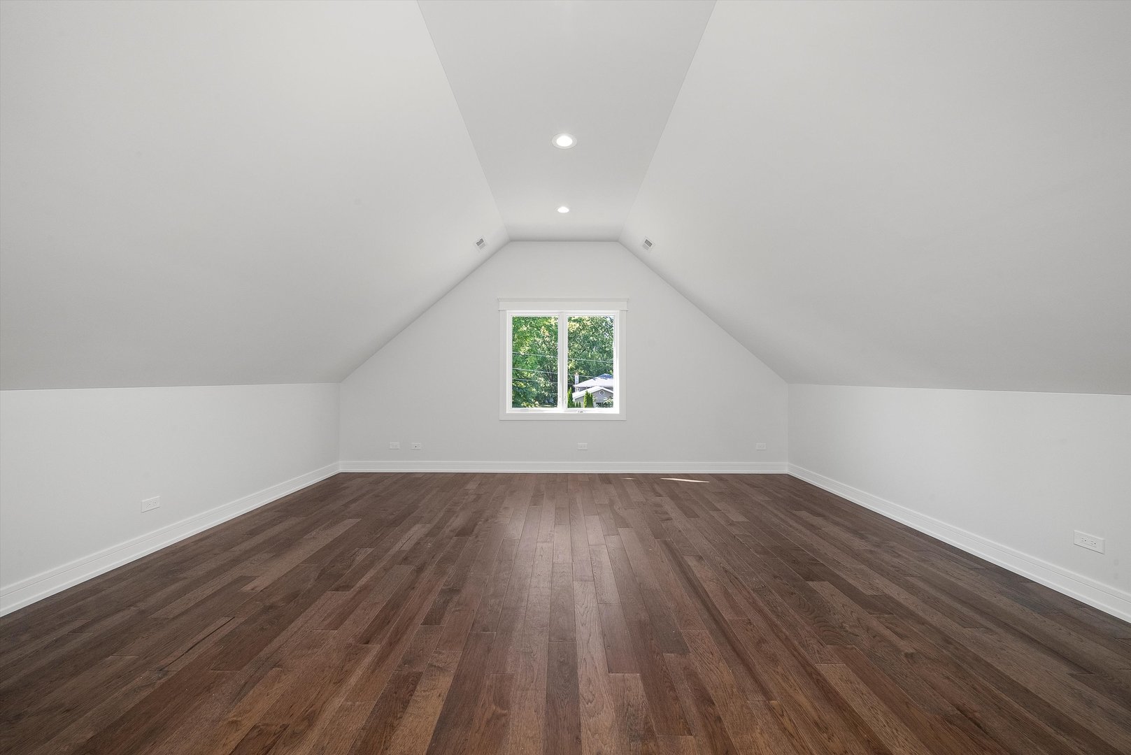 10441 South 83rd Avenue Palos Hills, IL 60465 - Photo 34 of 47 an empty room with wooden floor and windows