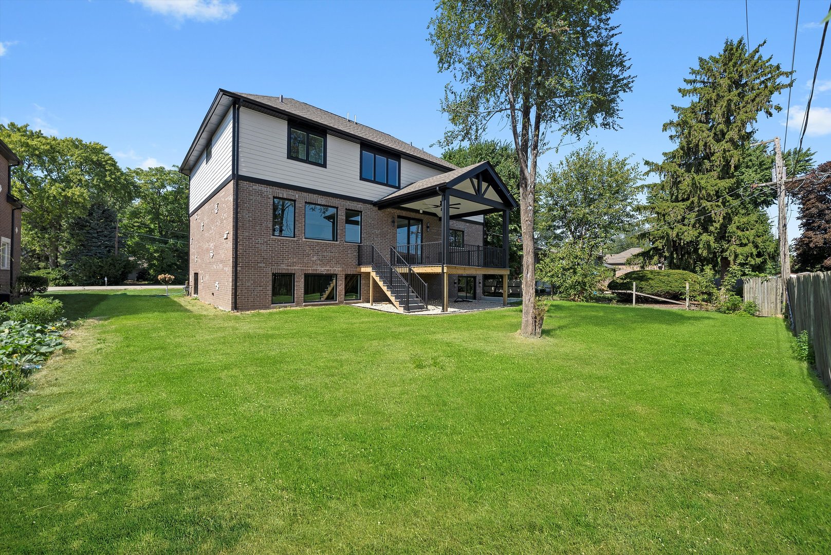 10441 South 83rd Avenue Palos Hills, IL 60465 - Photo 39 of 47 a front view of a house with a yard