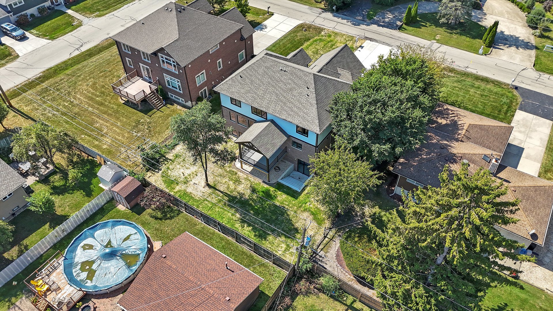 10441 South 83rd Avenue Palos Hills, IL 60465 - Photo 45 of 47 an aerial view of a house with a yard basket ball court and outdoor seating