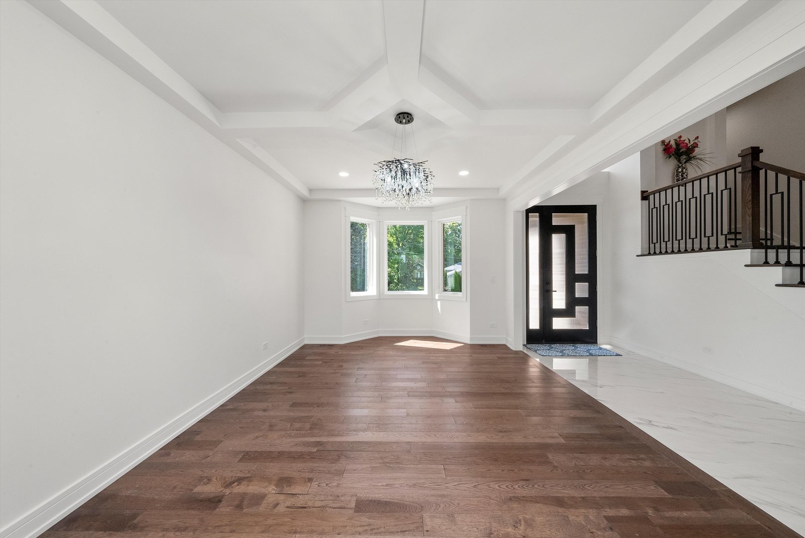 10441 South 83rd Avenue Palos Hills, IL 60465 - Photo 6 of 47 wooden floor in an empty room with a window