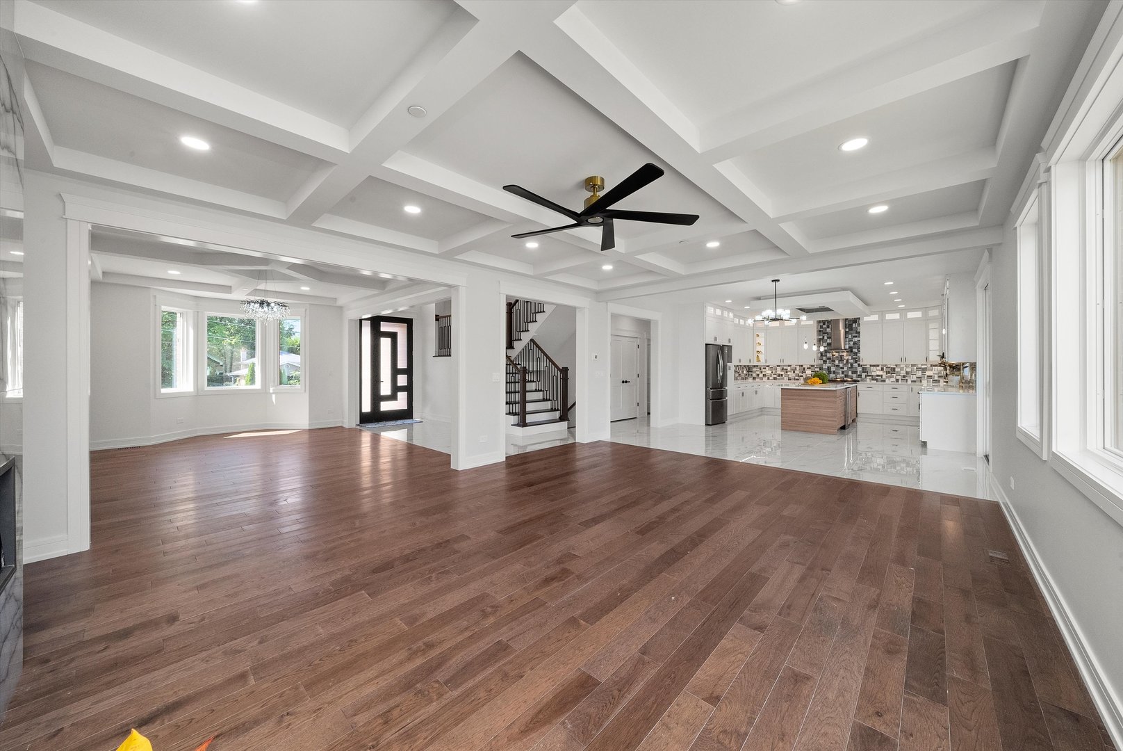 10441 South 83rd Avenue Palos Hills, IL 60465 - Photo 9 of 47 a view of an empty room with wooden floor and a window