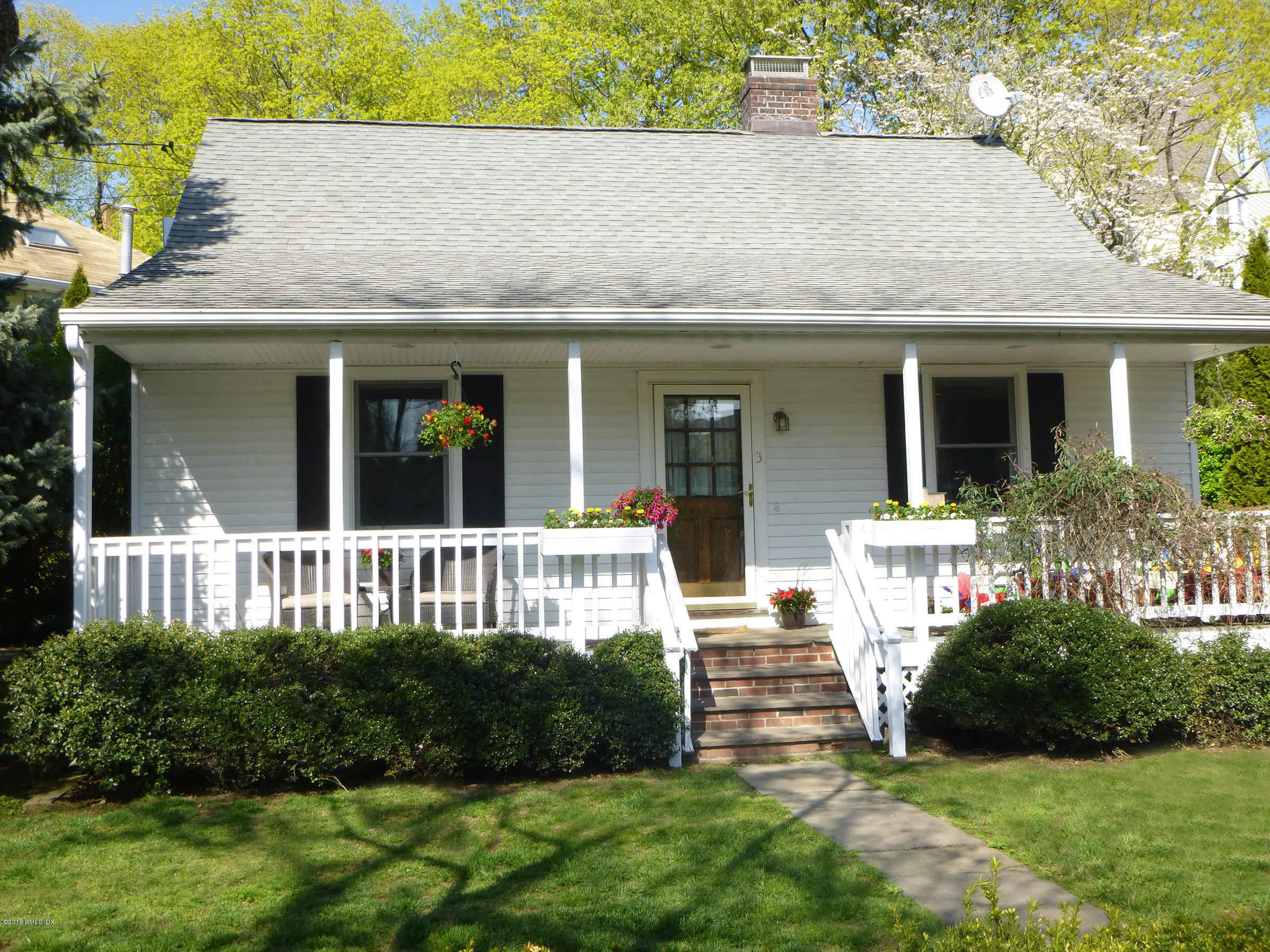 3 Idlewild Manor Greenwich, CT 06830 - Photo 26 of 26 a view of a house with garden and yard