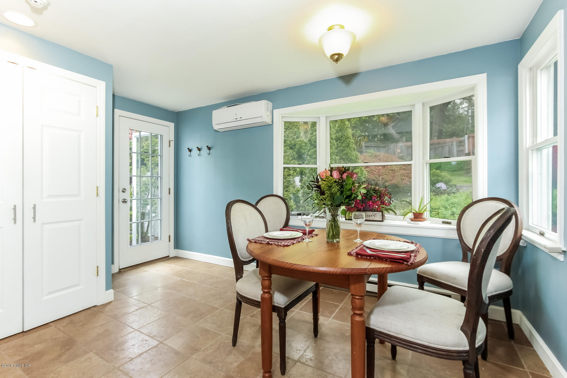 3 Idlewild Manor Greenwich, CT 06830 - Photo 8 of 26 a view of a dining room with furniture window and outside view