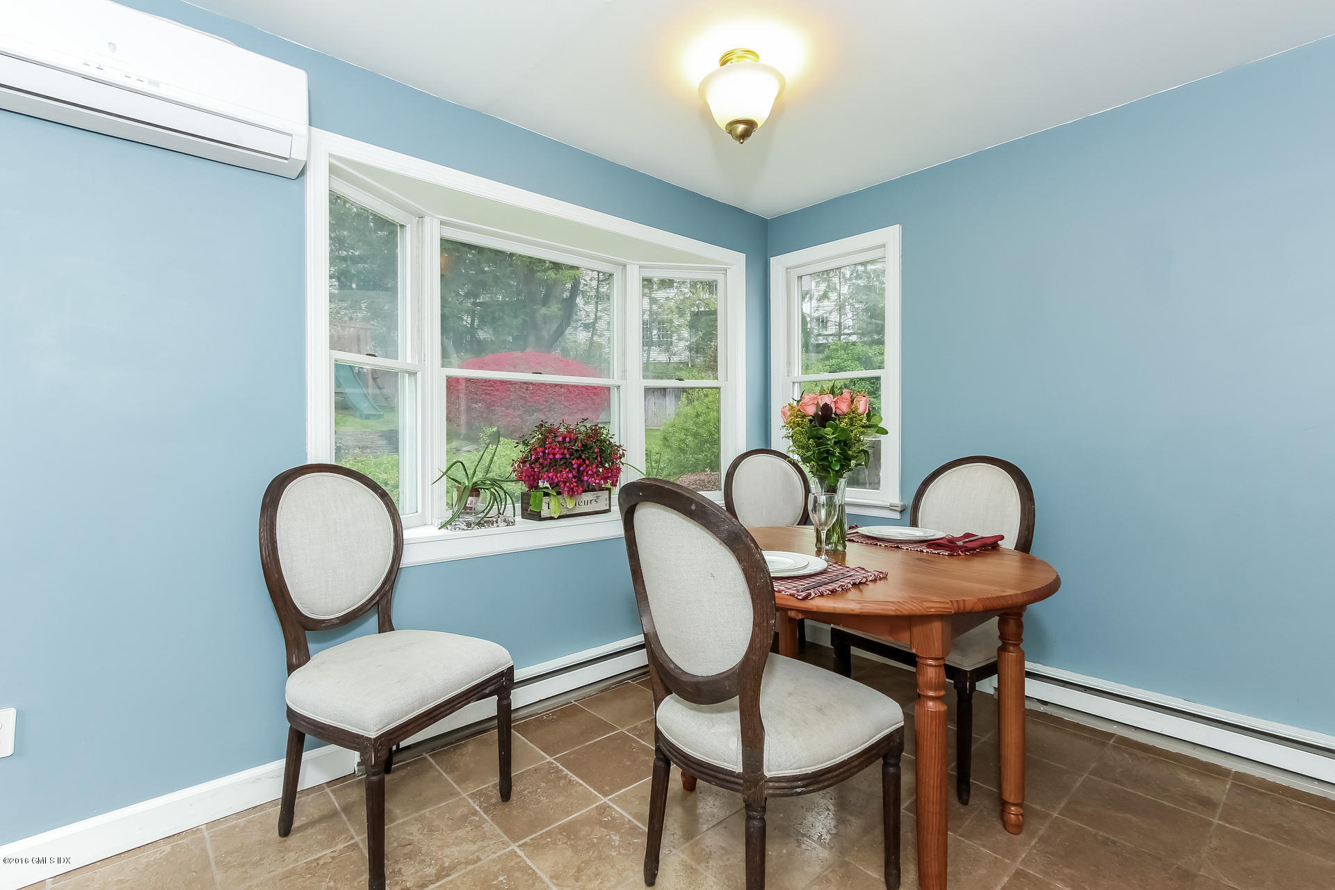 3 Idlewild Manor Greenwich, CT 06830 - Photo 10 of 26 a view of a dining room with furniture window and wooden floor