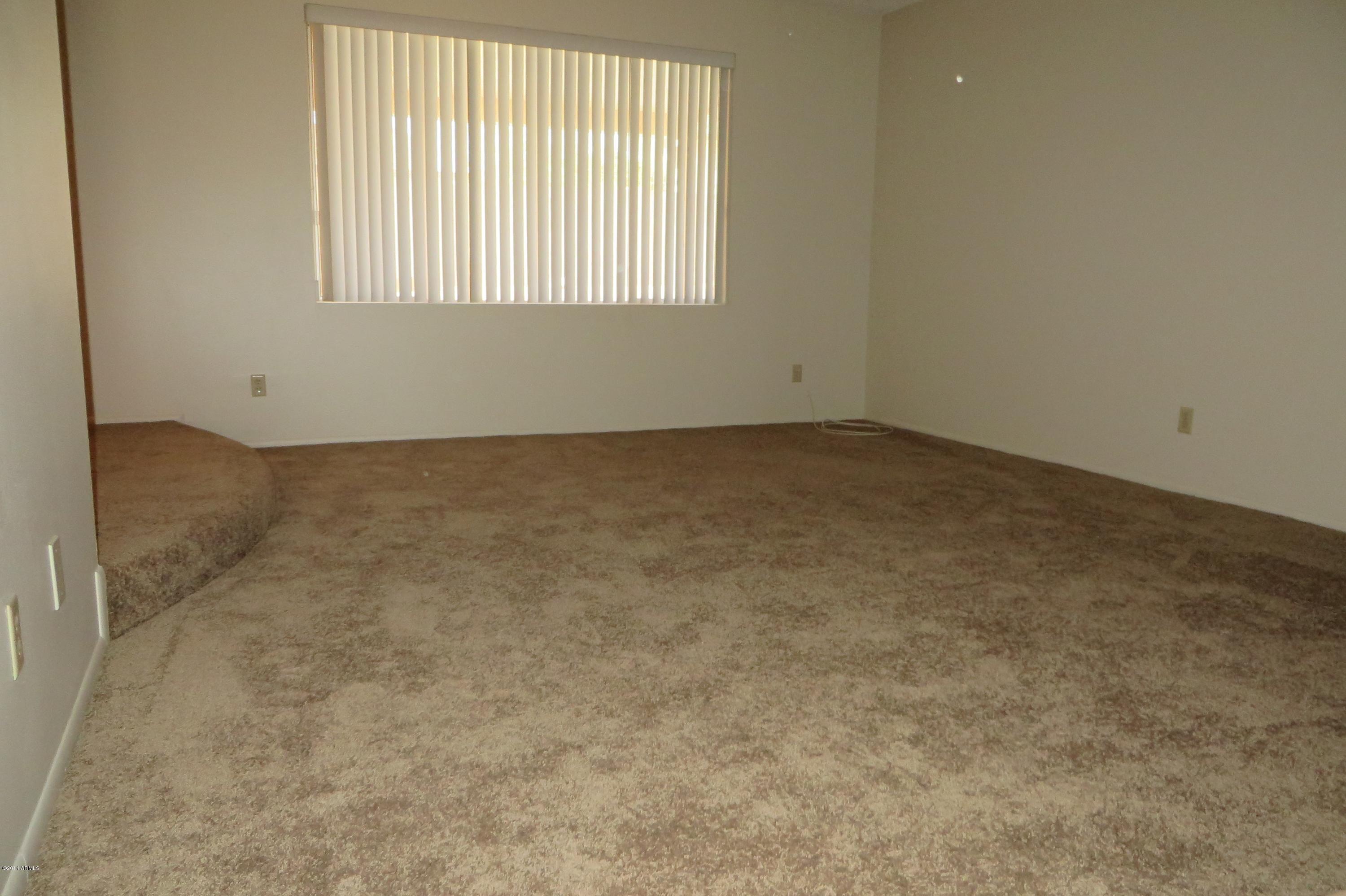4258 West Redfield Road Phoenix, AZ 85053 - Photo 12 of 20 FORMAL LIVING ROOM