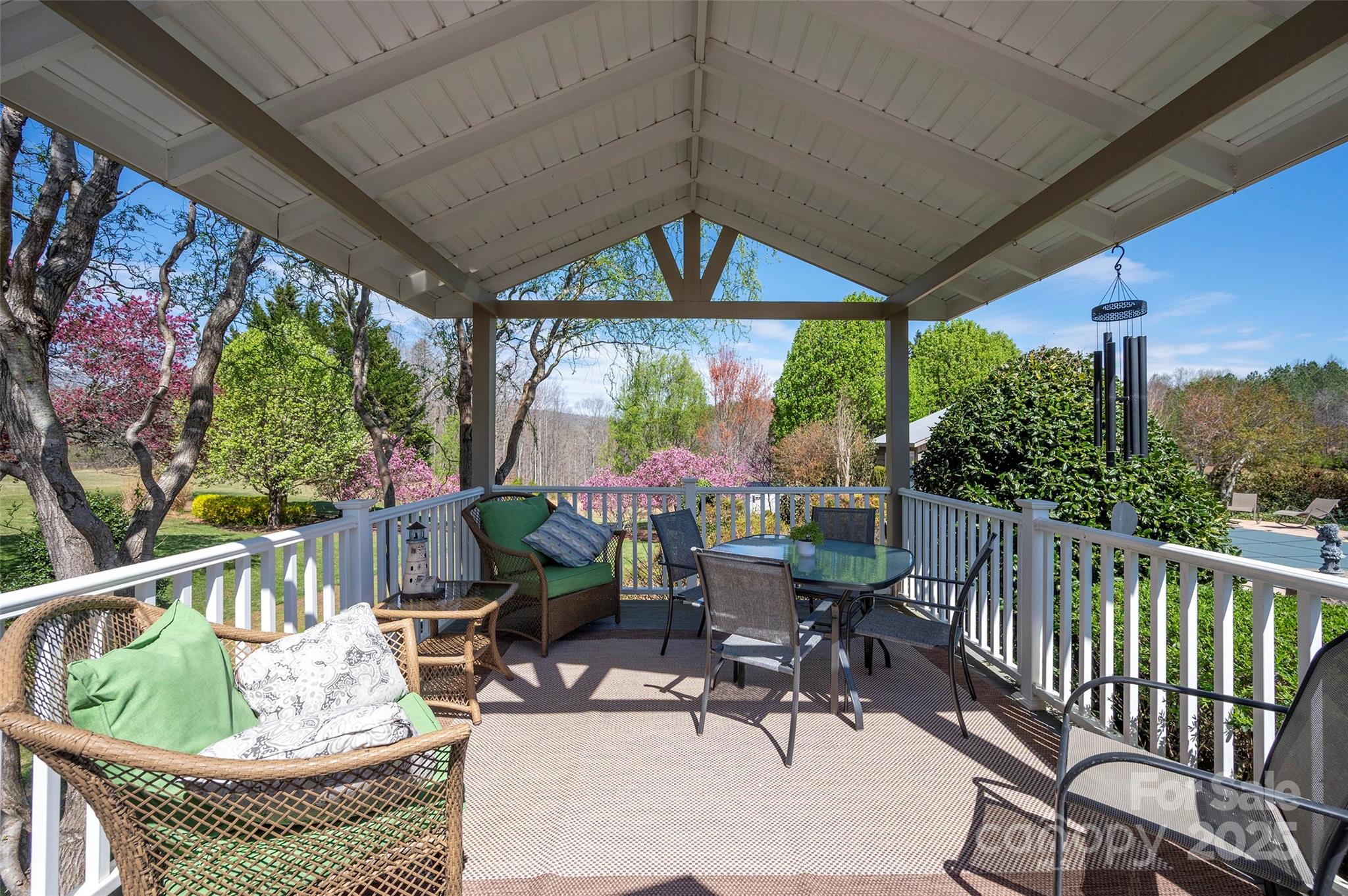 1120 Fred Merritt Road King, NC 27021 - Photo 12 of 45 a view of a patio with a table chairs and a potted plant