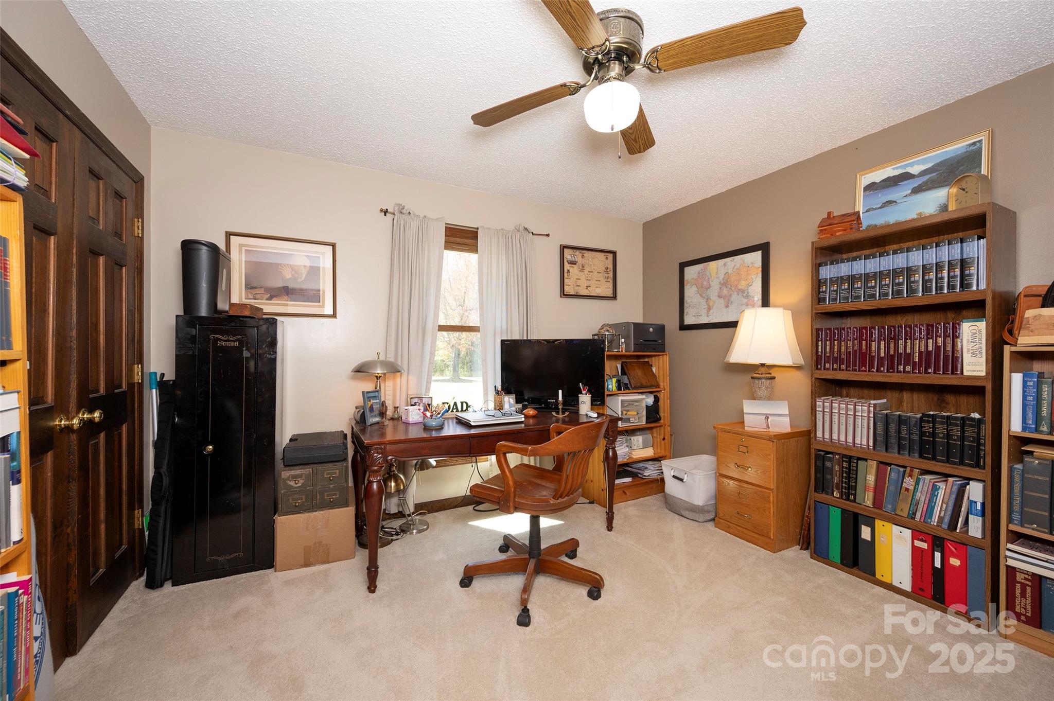 1120 Fred Merritt Road King, NC 27021 - Photo 32 of 45 a view of a livingroom with workspace and a window