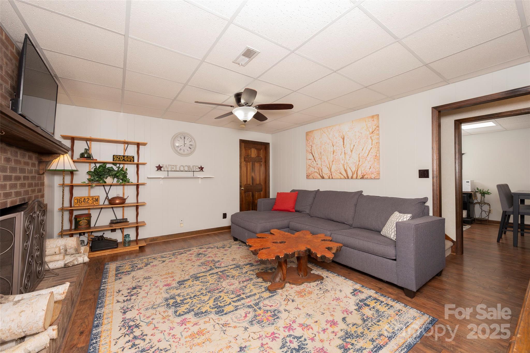 1120 Fred Merritt Road King, NC 27021 - Photo 33 of 45 a living room with furniture and a flat screen tv