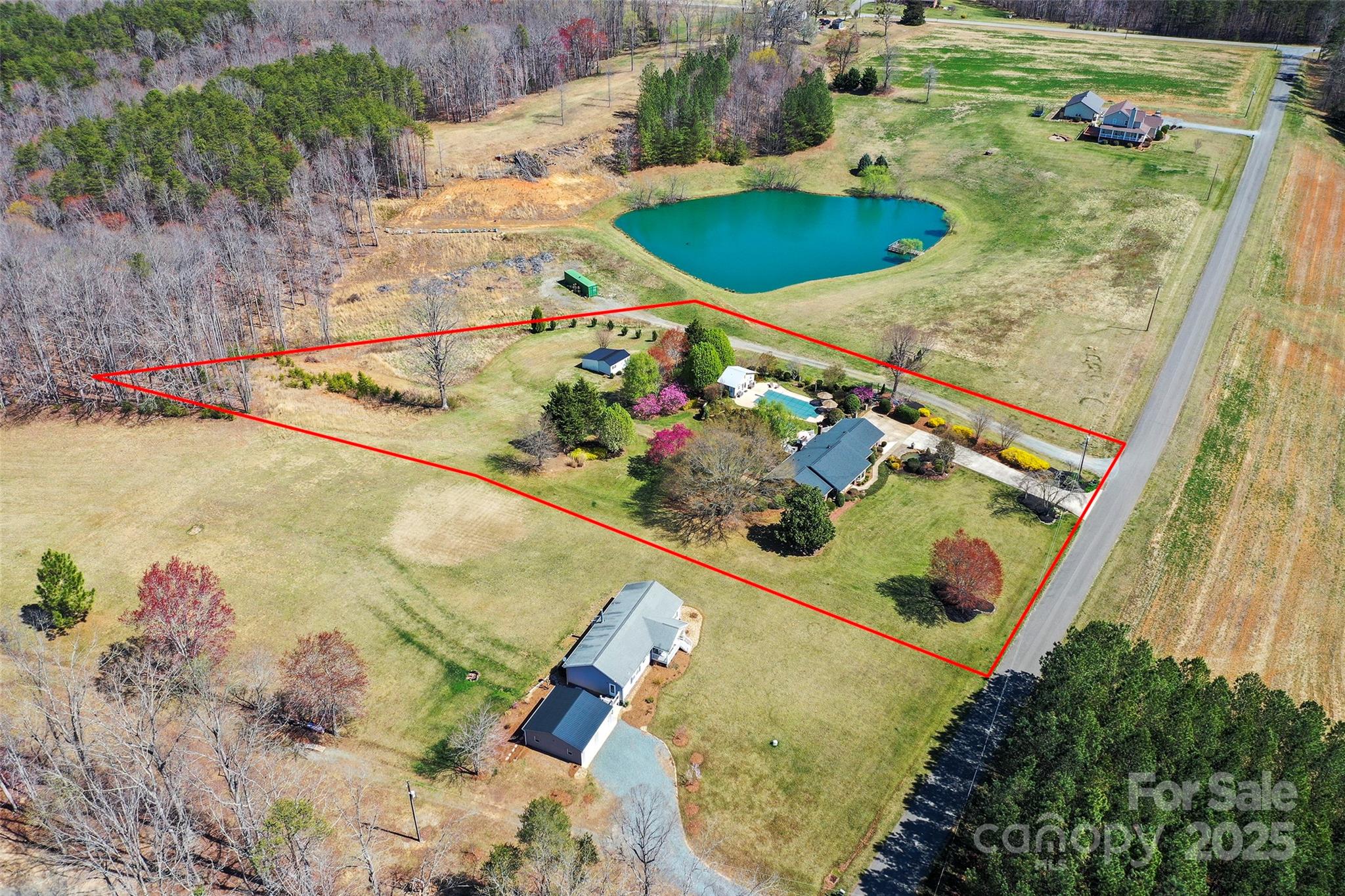 1120 Fred Merritt Road King, NC 27021 - Photo 41 of 45 an aerial view of a pool patio water and yard