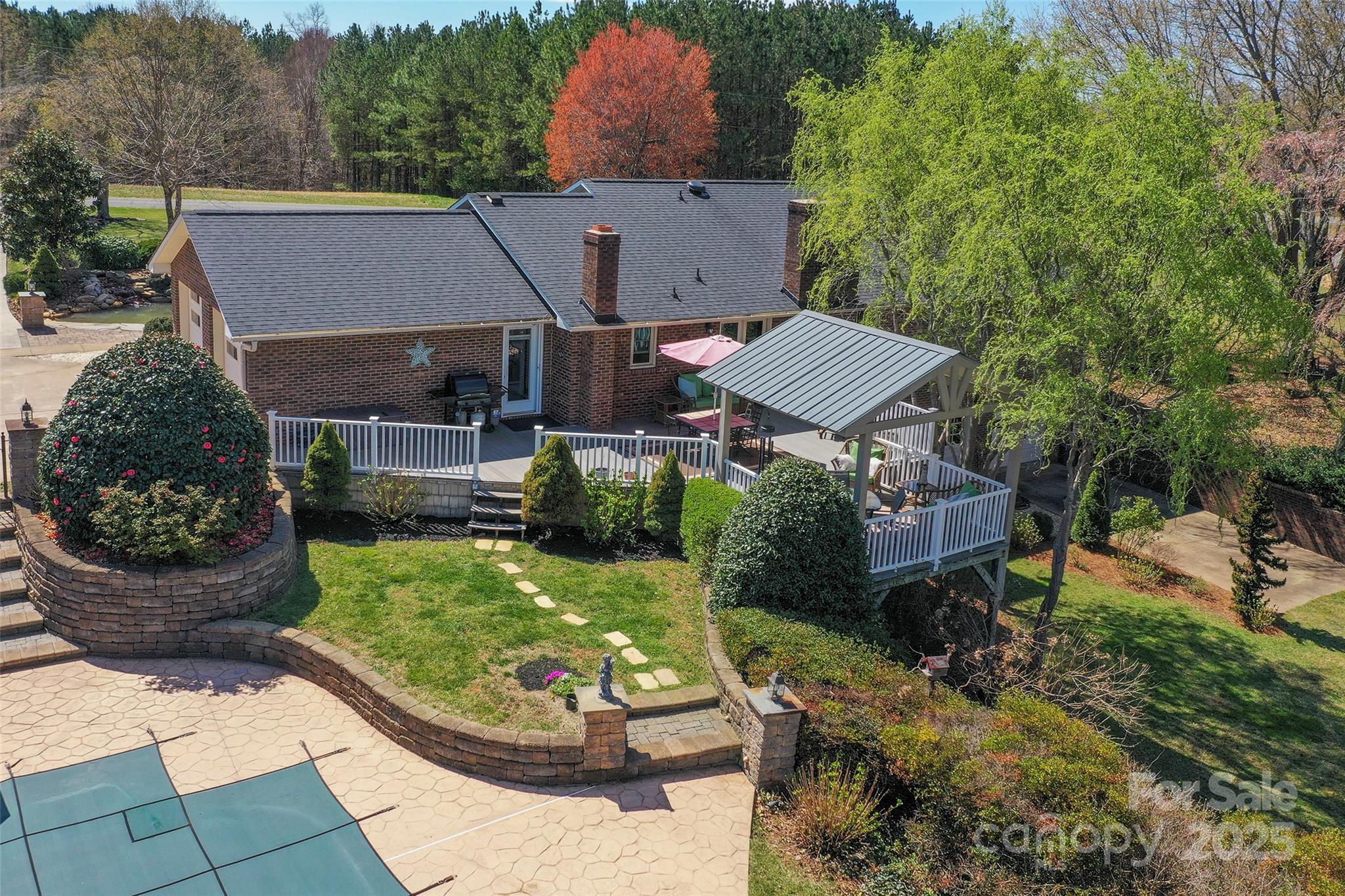 1120 Fred Merritt Road King, NC 27021 - Photo 8 of 45 an aerial view of a house with garden