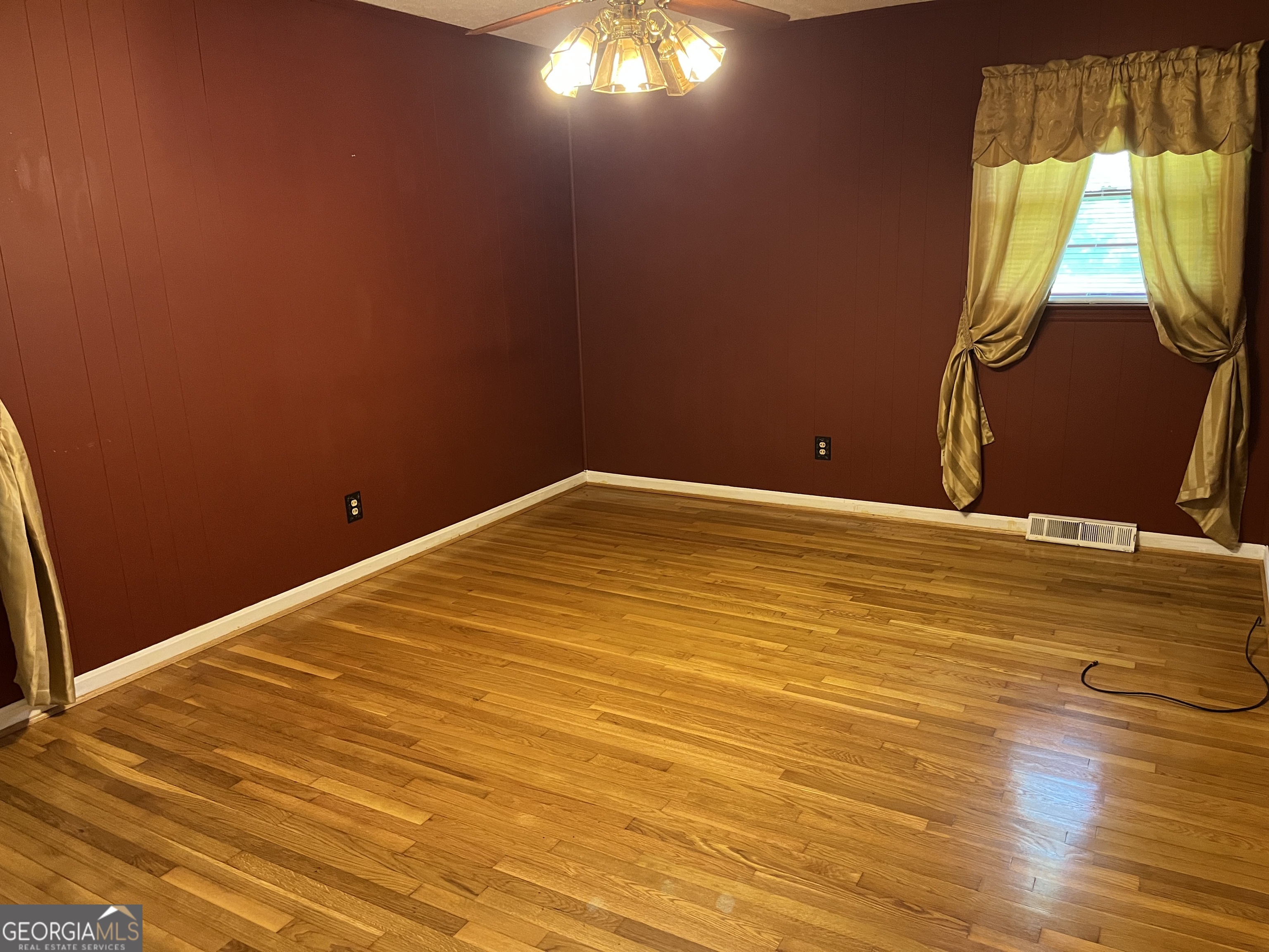 30 Highway 411 Street Southeast Cave Spring, GA 30124 - Photo 9 of 12 a view of empty room with wooden floor and windows