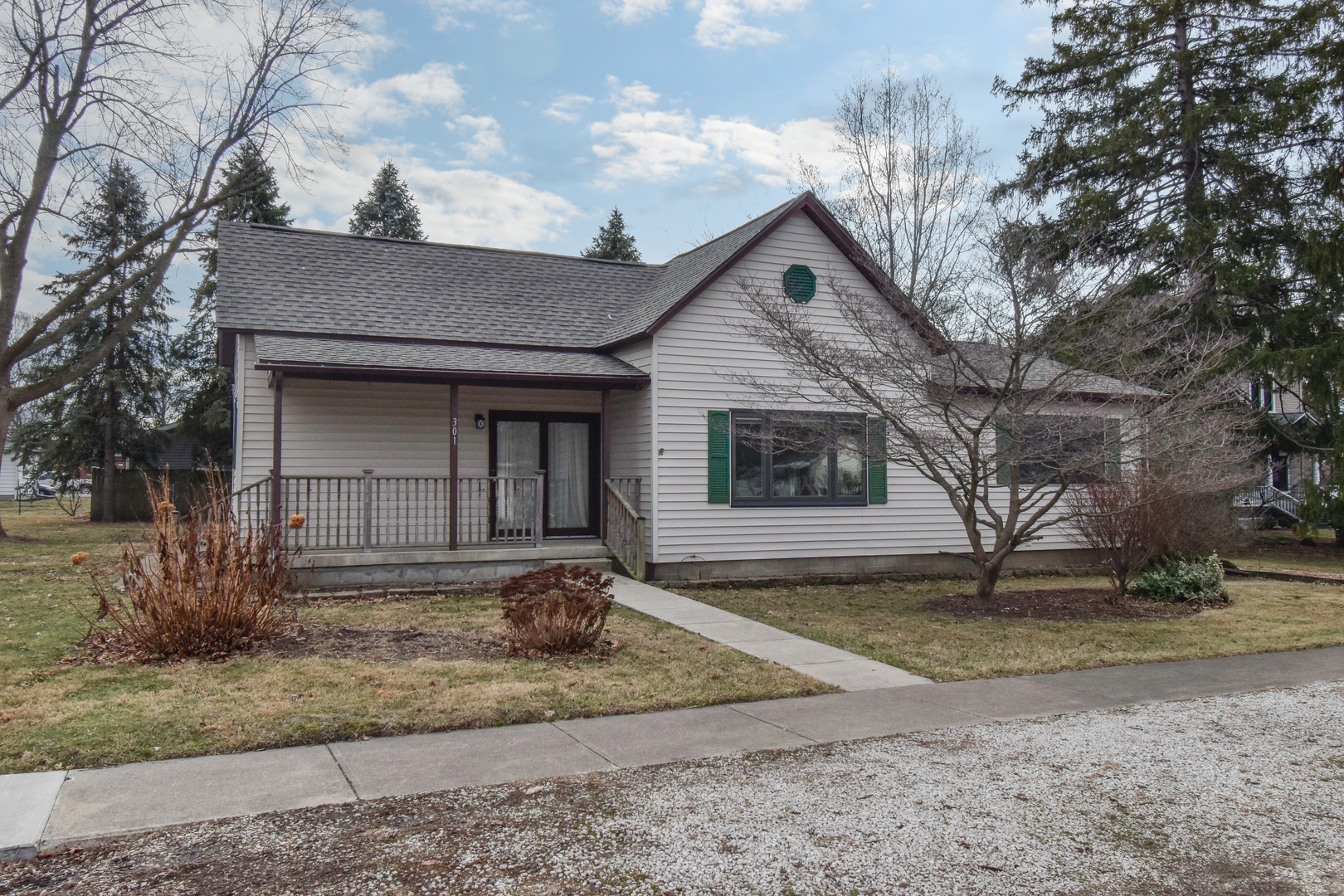 301 East Douglas Street St. Joseph, IL 61873 - Photo 1 of 38 a front view of a house with garden