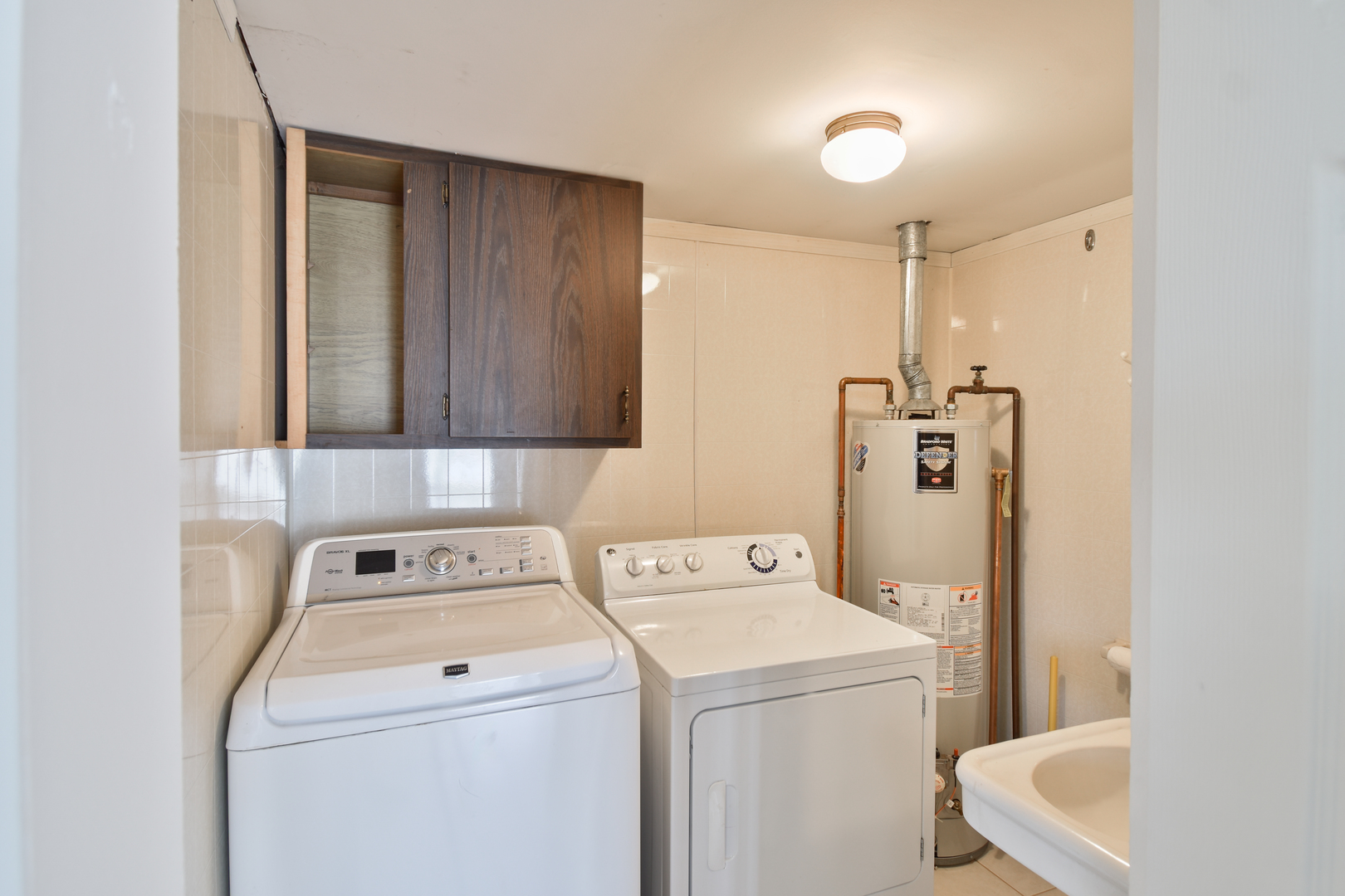 301 East Douglas Street St. Joseph, IL 61873 - Photo 14 of 38 a utility room with dryer and washer