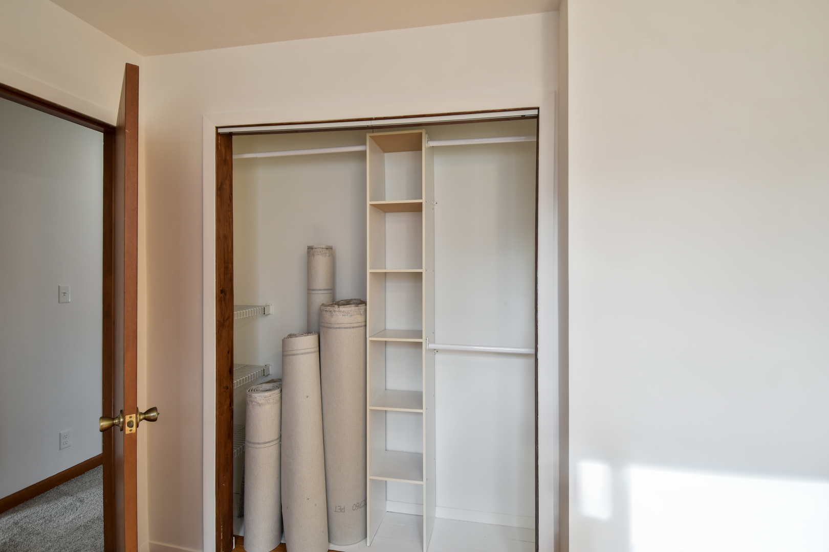 301 East Douglas Street St. Joseph, IL 61873 - Photo 25 of 38 a bathroom with a glass shower door