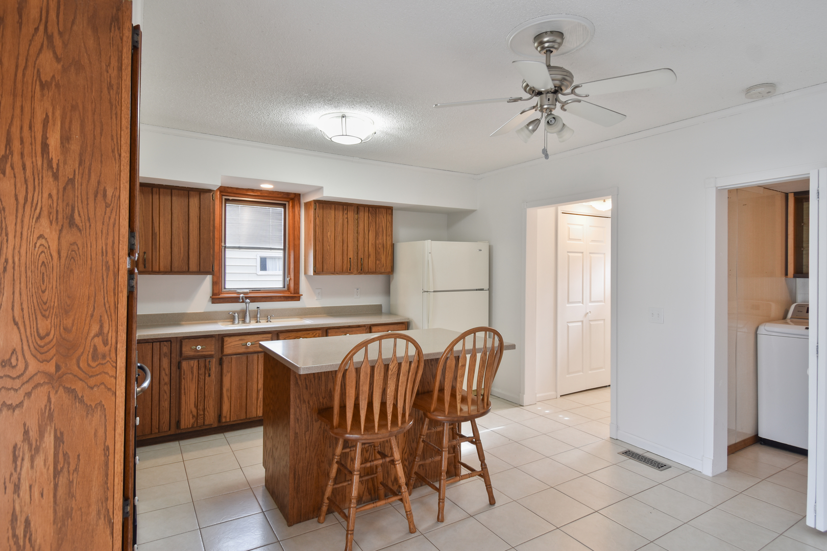 301 East Douglas Street St. Joseph, IL 61873 - Photo 5 of 38 a dining room with furniture and window