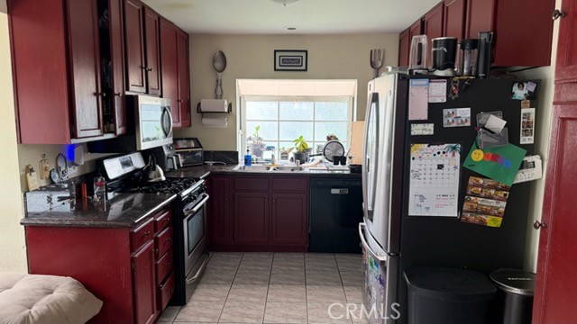 2478 KOA Drive Rialto, CA 92377 - Photo 18 of 18 a kitchen with a sink stove and refrigerator