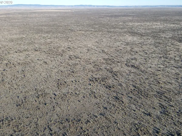a view of beach and an ocean
