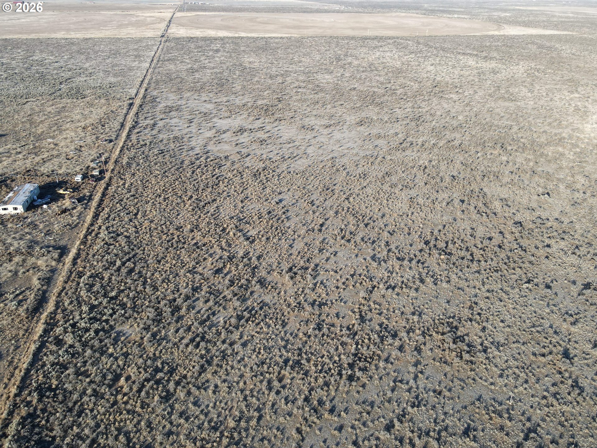 Taylor Road, Unit 6300 Burns, OR 97720 - Photo 9 of 19 a bathroom with a shower curtain