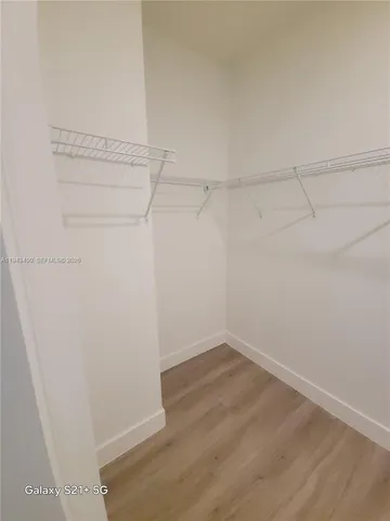 a view of a room with racks on the wall